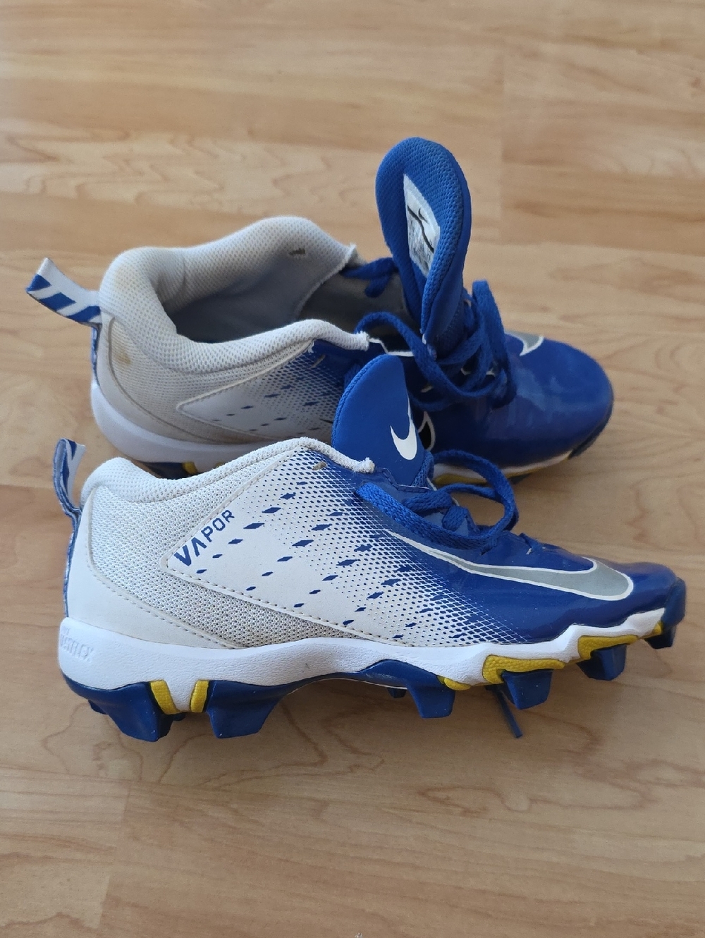 Nike Kids Blue and White Vapor Cleats with Yellow Accents